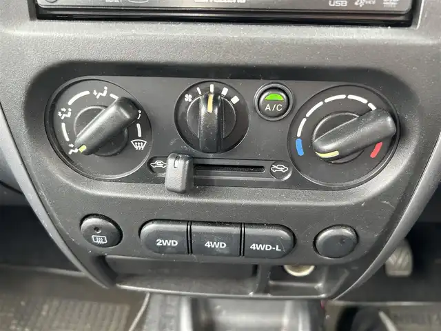 スズキ ジムニー XG 道央・札幌 2008(平20)年 11.1万km ゴールド ４WD/社外SDナビ/AM/FM/CD/DVD/BT/ワンセグ/ヘッドライトレベライザー/リモコンキー/スペアタイヤ