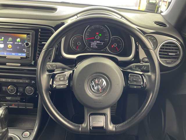 フォルクスワーゲン ザ・ビートル Rラインマイスター 岐阜県 2019(令1)年 6.6万km 黒 7インチナビ/　(TV/CD/DVD/Bluetooth/SD/USB/VTR/iPod)/革巻きステアリング/ステアリングリモコン/パドルシフト/HIDヘッドライト/オートライト/ヘッドライトレベライザー/黒革シート/シートヒーター(D/N席)/防眩ミラー/リアトラフィック/ブラインドスポットビューモニター/コーナーセンサー/スマートキー/プッシュスタート/スペアキー