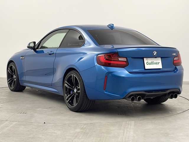 ＢＭＷ Ｍ２ 三重県 2017(平29)年 7万km ロングビーチブルーメタリック 禁煙車/純正HDDナビ/CD/DVD/BT/AUX/バックカメラ/衝突被害軽減ブレーキ/レーンキープアシスト/クルーズコントロール/レザーシート/シートヒーター/ビルトインETC/パドルシフト/オートライト/メモリシート/アイドリングストップ