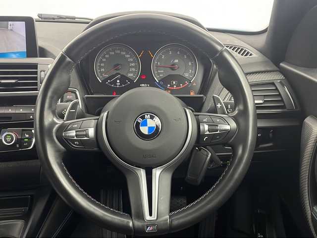 ＢＭＷ Ｍ２ 三重県 2017(平29)年 7万km ロングビーチブルーメタリック 禁煙車/純正HDDナビ/CD/DVD/BT/AUX/バックカメラ/衝突被害軽減ブレーキ/レーンキープアシスト/クルーズコントロール/レザーシート/シートヒーター/ビルトインETC/パドルシフト/オートライト/メモリシート/アイドリングストップ