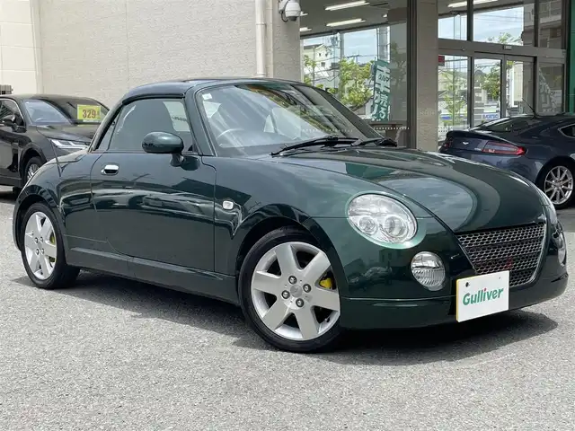 ダイハツ コペン アクティブトップ 和歌山県 2005(平17)年 8.5万km ダークグリーンマイカ 社外オーディオ（AM/FM/CD/AUX）/純正マット/純正アルミホイール/取扱説明書