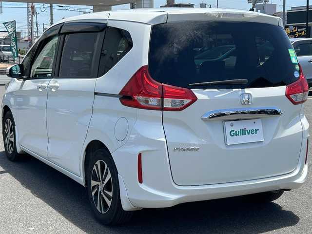 ホンダ フリード G ホンダセンシング 広島県 2017(平29)年 8.4万km ホワイトオーキッドパール ワンオーナー/純正ナビ/「CD/DVD/Bluetooth/フルセグTV/AM/FM」/バックカメラ/両側パワースライドドア/衝突被害軽減システム/レーダークルーズコントロール/レーンキープアシスト/標識認識機能/路外逸脱抑制機能/LEDヘッドライト/オートライト/ドライブレコーダー/ETC/プッシュスタート/スペアキー×1/保証書/取扱説明書