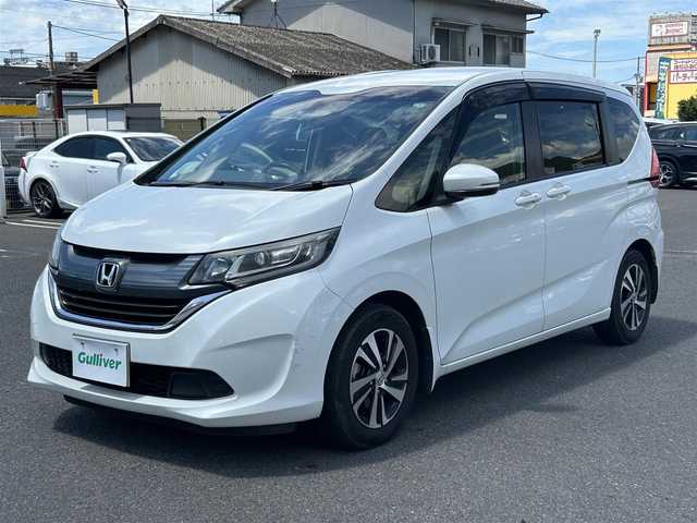 ホンダ フリード G ホンダセンシング 広島県 2017(平29)年 8.4万km ホワイトオーキッドパール ワンオーナー/純正ナビ/「CD/DVD/Bluetooth/フルセグTV/AM/FM」/バックカメラ/両側パワースライドドア/衝突被害軽減システム/レーダークルーズコントロール/レーンキープアシスト/標識認識機能/路外逸脱抑制機能/LEDヘッドライト/オートライト/ドライブレコーダー/ETC/プッシュスタート/スペアキー×1/保証書/取扱説明書
