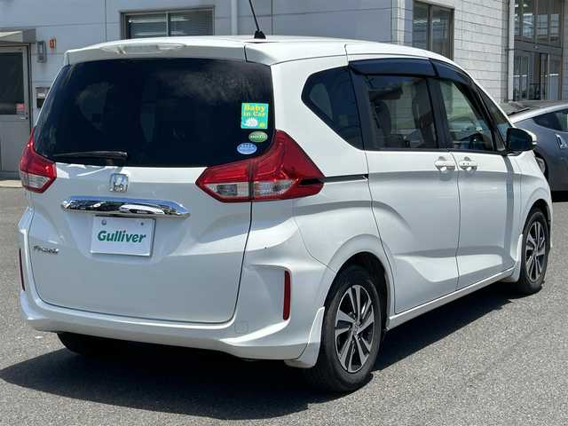 ホンダ フリード G ホンダセンシング 広島県 2017(平29)年 8.4万km ホワイトオーキッドパール ワンオーナー/純正ナビ/「CD/DVD/Bluetooth/フルセグTV/AM/FM」/バックカメラ/両側パワースライドドア/衝突被害軽減システム/レーダークルーズコントロール/レーンキープアシスト/標識認識機能/路外逸脱抑制機能/LEDヘッドライト/オートライト/ドライブレコーダー/ETC/プッシュスタート/スペアキー×1/保証書/取扱説明書
