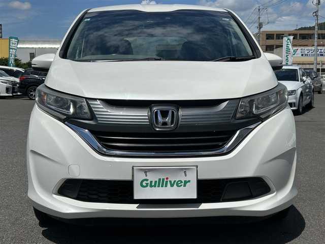ホンダ フリード G ホンダセンシング 広島県 2017(平29)年 8.4万km ホワイトオーキッドパール ワンオーナー/純正ナビ/「CD/DVD/Bluetooth/フルセグTV/AM/FM」/バックカメラ/両側パワースライドドア/衝突被害軽減システム/レーダークルーズコントロール/レーンキープアシスト/標識認識機能/路外逸脱抑制機能/LEDヘッドライト/オートライト/ドライブレコーダー/ETC/プッシュスタート/スペアキー×1/保証書/取扱説明書
