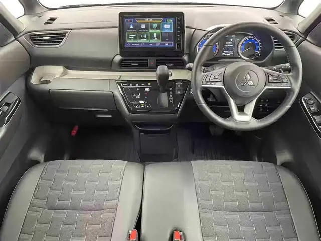 三菱 デリカミニ T プレミアム 栃木県 2025(令7)年 0.2万km オレンジⅡ 4WD/ターボ/デジタルルームーミラー/マルチアラウンドモニター/三菱e-Assist デリカミニ Tプレミアム/　衝突被害軽減ブレーキ/　踏み間違い防止アシスト/　オートハイビーム/　車線逸脱警告/　先行者発進通知/　標識認知システム/　車線維持支援/　ふらつき警報/　前方衝突予測警報/高速道路 同一車線運転支援機能 マイパイロット/レーダークルーズコントロール/ヒルディセントコントロール/両側パワースライドドア/ビルトインETC/ルーフレール/ステアリングヒーター/シートヒーター/アイドリングストップ/LEDヘッドライト/LEDフォグランプ/助手席シートバックテーブル/純正15インチアルミホイール/純正フロアマット(ラバータイプ)/スマートキー×2本/保証書、取扱説明書