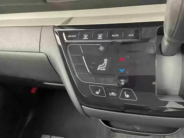 三菱 デリカミニ T プレミアム 栃木県 2025(令7)年 0.2万km オレンジⅡ 4WD/ターボ/デジタルルームーミラー/マルチアラウンドモニター/三菱e-Assist デリカミニ Tプレミアム/　衝突被害軽減ブレーキ/　踏み間違い防止アシスト/　オートハイビーム/　車線逸脱警告/　先行者発進通知/　標識認知システム/　車線維持支援/　ふらつき警報/　前方衝突予測警報/高速道路 同一車線運転支援機能 マイパイロット/レーダークルーズコントロール/ヒルディセントコントロール/両側パワースライドドア/ビルトインETC/ルーフレール/ステアリングヒーター/シートヒーター/アイドリングストップ/LEDヘッドライト/LEDフォグランプ/助手席シートバックテーブル/純正15インチアルミホイール/純正フロアマット(ラバータイプ)/スマートキー×2本/保証書、取扱説明書