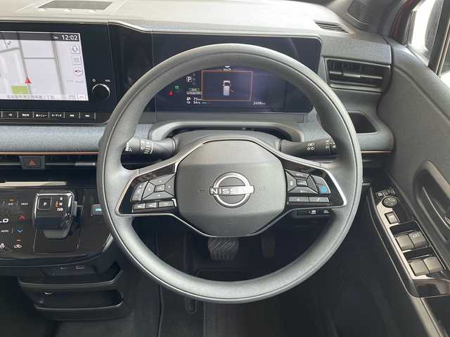 日産 サクラ X 90周年記念車 愛知県 2024(令6)年 0.3万km スパークリングレッド/ブラック プロパイロット/衝突軽減システム/純正9型ディズプレイオーディオ　ナビあり/全方位カメラ/クルーズコントロール/シートヒーター/フルセグ/Bluetzooth/バックカメラ/コーナーセンサー/純正アルミホイール/ETC2.0/LEDヘッドライト/ステアリングヒーター/オートライト/ドライブレコーダー/ステアリングスイッチ/スマートキー/プッシュスタート