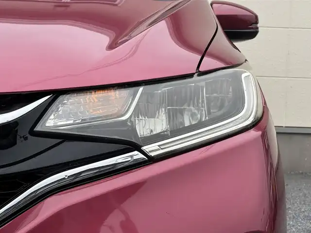 ホンダ フィット 13G L ホンダセンシング 茨城県 2018(平30)年 7.5万km ルージュアメジストM 純正ナビ(フルセグ/AMFM/Bluetooth)/純正ドライブレコーダー/バックカメラ/クルーズコントロール/オートエアコン/ビルトインＥＴＣ/レーンキープアシスト/純正フロアマット/保証書