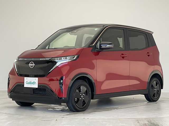 日産 サクラ X 90周年記念車 愛知県 2024(令6)年 0.5万km スパークリングレッド/ブラック プロパイロット/衝突軽減システム/純正９型ディスプレイオーディオ（ナビあり）/全方位カメラ/シートヒーター/フルセグ/Bluetooth/バックカメラ/コーナーセンサー/純正アルミホイール/LEDヘッドライト/オートマチックハイビーム/ドライブレコーダー/ＥＴＣ２．０/ステアリングスイッチ/スマートキー/プッシュスタート