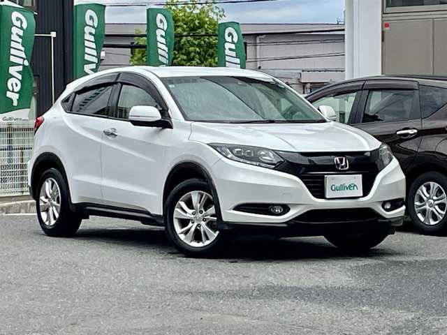 ホンダ ヴェゼル X ホンダセンシング 宮城県 2016(平28)年 4.9万km ホワイトオーキッドパール 社外ナビ（CD/DVD/AM/FM/iPod/SD/USB/BT）/フルセグTV/バックカメラ/ドライブレコーダー前後/レーダークルーズコントロール/レーンキープアシスト/衝突被害軽減システム/電動パーキングブレーキ/LEDヘッドライト/サマータイヤ純正AW（215/60R16）/スタッドレスタイヤ社外AW（215/60R16）/ETC/プッシュスタート/スマートキー/スペアキー/保証書、取扱説明書