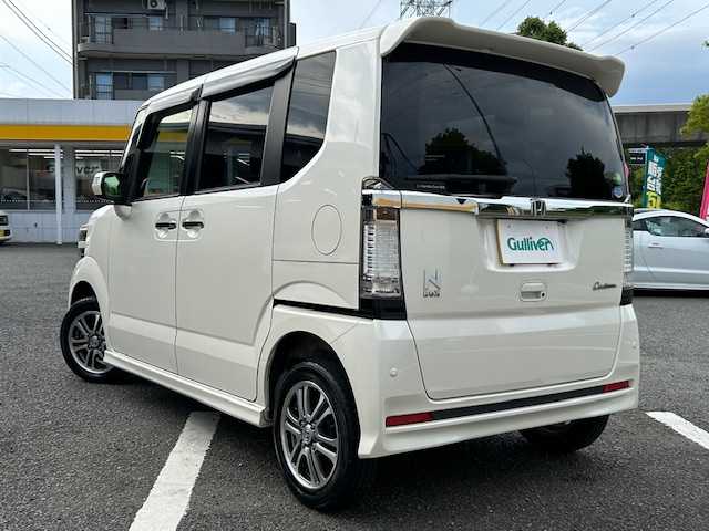 ホンダ Ｎ ＢＯＸ カスタム SSパッケージ 神奈川県 2014(平26)年 8.1万km プレミアムホワイトパール ●Ｃｕｓｔｏｍ　ＳＳパッケージ/●4WD/●ギャザーズナビ/CD /DVD /BT /SD /地デジ/●バックカメラ/●ETC2.0/●両側パワースライドドア/●シートヒーター（運転席/助手席）/●あんしんパッケージ/シティブレーキアクティブシステム/前席用i-サイドエアバッグシステム/サイドカーテンエアバッグシステム/●ピアノブラック調インパネガーニッシュ/●クロームメッキ・セレクトレバーボタン/●オーディオリモートコントロールスイッチ/●14インチアルミホイール/●HIDヘッドライト/●フォグライト/●ドアミラーウインカー/●VSA（ABS＋TCS＋横すべり抑制）/●エマージェンシーストップシグナル/●ヒルスタートアシスト機能/●アイドリングストップ/●ECONスイッチ/●運転席ハイトアジャスター/●スマートキー2個/●保証書/●取扱説明書