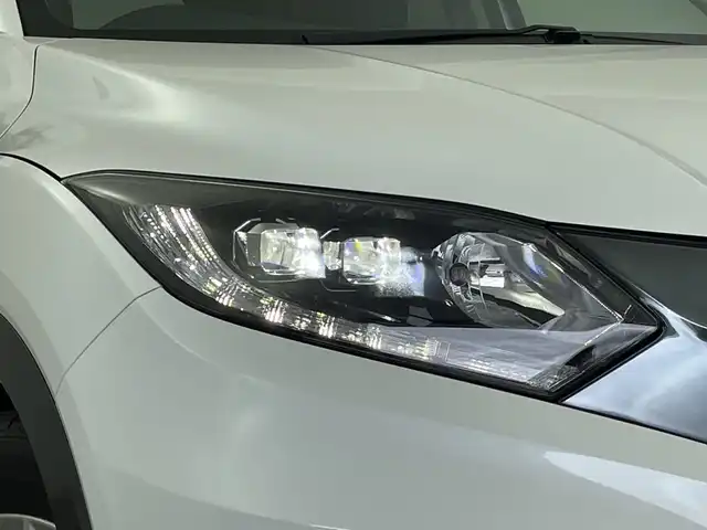 ホンダ ヴェゼル ハイブリッド X 新潟県 2016(平28)年 3.7万km ホワイトオーキッドパール 純正メモリナビ【VXM-164VFi】/　フルセグTV/Bluetooth/CD/DVD/USB/衝突被害軽減ブレーキ/クルーズコントロール/純正ドライブレコーダー/バックモニター/ETC/LEDヘッドライト/横滑り防止装置/オートライト/レザーステアリング/パドルシフト
