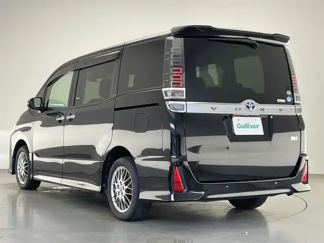 トヨタ ヴォクシー ハイブリッド ZS 煌Ⅱ 愛知県 2019(平31)年 2.8万km ブラック 純正１０型ナビ　純正１２型後席モニター　両側パワスラ　フルセグＴＶ　シートヒーター　バックカメラ　純正ドラレコ　ＥＴＣ　セーフティセンス　衝突軽減　レーンキープ　３眼ＬＥＤ　クルコン　プッシュスタート　スマートキー　コーナーセンサー　オートハイビーム　レーンキープ　