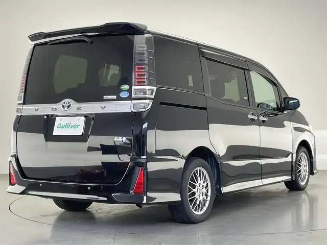 トヨタ ヴォクシー ハイブリッド ZS 煌Ⅱ 愛知県 2019(平31)年 2.8万km ブラック 純正１０型ナビ　純正１２型後席モニター　両側パワスラ　フルセグＴＶ　シートヒーター　バックカメラ　純正ドラレコ　ＥＴＣ　セーフティセンス　衝突軽減　レーンキープ　３眼ＬＥＤ　クルコン　プッシュスタート　スマートキー　コーナーセンサー　オートハイビーム　レーンキープ　