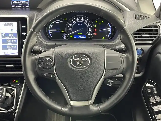 トヨタ ヴォクシー ハイブリッド ZS 煌Ⅱ 愛知県 2019(平31)年 2.8万km ブラック 純正１０型ナビ　純正１２型後席モニター　両側パワスラ　フルセグＴＶ　シートヒーター　バックカメラ　純正ドラレコ　ＥＴＣ　セーフティセンス　衝突軽減　レーンキープ　３眼ＬＥＤ　クルコン　プッシュスタート　スマートキー　コーナーセンサー　オートハイビーム　レーンキープ　