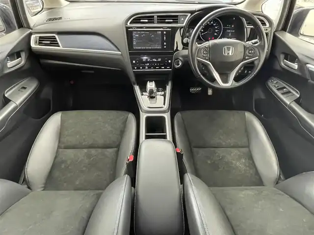 ホンダ シャトル ハイブリッド X ホンダセンシング 滋賀県 2017(平29)年 7.1万km ミスティックガーネットP 純正7インチナビ/【Bluetooth/CD/DVD/フルセグTV】/ハーフレザーシート/ホンダセンシング/・衝突軽減ブレーキ/・誤発進抑制機能/・歩行者事故低減ステアリング/・路外逸脱抑制機能/・アダプティブクルーズコントロール/・LKAS〈車線維持支援システム〉/・先行車発進お知らせ機能/・標識認識機能/バックカメラ/LEDヘッドライト/D/Nシートヒーター/前方ドライブレコーダー/MTモード付AT/純正フロアマット/プッシュスタート/スマートキー/ステアリングリモコン