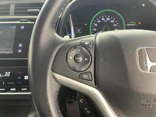 ホンダ シャトル ハイブリッド X ホンダセンシング 滋賀県 2017(平29)年 7.1万km ミスティックガーネットP 純正7インチナビ/【Bluetooth/CD/DVD/フルセグTV】/ハーフレザーシート/ホンダセンシング/・衝突軽減ブレーキ/・誤発進抑制機能/・歩行者事故低減ステアリング/・路外逸脱抑制機能/・アダプティブクルーズコントロール/・LKAS〈車線維持支援システム〉/・先行車発進お知らせ機能/・標識認識機能/バックカメラ/LEDヘッドライト/D/Nシートヒーター/前方ドライブレコーダー/MTモード付AT/純正フロアマット/プッシュスタート/スマートキー/ステアリングリモコン