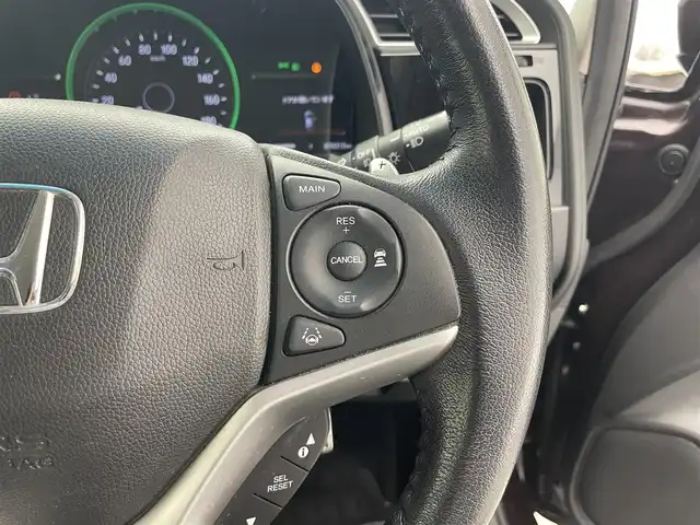 ホンダ シャトル ハイブリッド X ホンダセンシング 滋賀県 2017(平29)年 7.1万km ミスティックガーネットP 純正7インチナビ/【Bluetooth/CD/DVD/フルセグTV】/ハーフレザーシート/ホンダセンシング/・衝突軽減ブレーキ/・誤発進抑制機能/・歩行者事故低減ステアリング/・路外逸脱抑制機能/・アダプティブクルーズコントロール/・LKAS〈車線維持支援システム〉/・先行車発進お知らせ機能/・標識認識機能/バックカメラ/LEDヘッドライト/D/Nシートヒーター/前方ドライブレコーダー/MTモード付AT/純正フロアマット/プッシュスタート/スマートキー/ステアリングリモコン