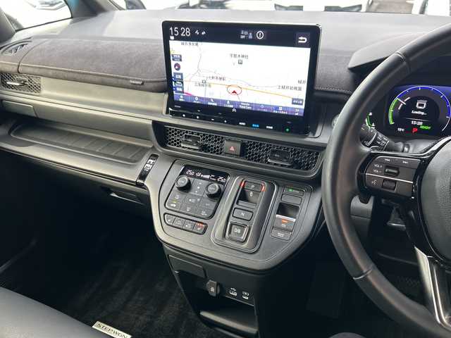 ホンダ ステップワゴン スパーダ eHEV プレミアムライン 広島県 2022(令4)年 5.2万km クリスタルブラックパール 禁煙/ホンダセンシング/純正11.4インチホンダコネクトナビ（LXM-237VFLi）/・CD/DVD/DTV/Bluetooth/MusicRack/スマホ連携/マルチビューモニター/パワーバックドア/両側パワースライドドア/減速セレクター/アダプティブクルーズコントロール/ハーフレザーシート/シートヒーター（１/2列目）/オットマンシート/LEDアクティブコーナリングライト/オートライト/アダプティブドライビングビーム/LEDフォグランプ/シーケンシャルタ―ンランプ/純正アルミホイール/コーナーセンサー/BSM/シートバックテーブル/ドライブレコーダー/ビルトインETC/純正フロアマット/純正ドアバイザー/電子パーキング/ブレーキホールド/スマートキー/プッシュスタート/スペアキー