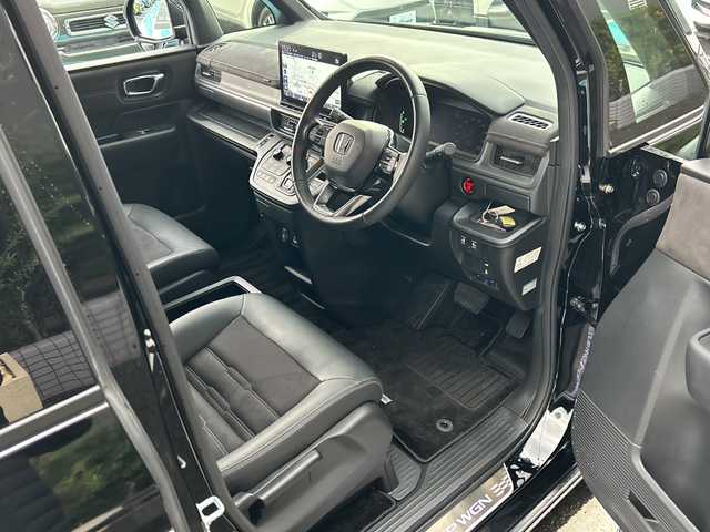 ホンダ ステップワゴン スパーダ eHEV プレミアムライン 広島県 2022(令4)年 5.2万km クリスタルブラックパール 禁煙/ホンダセンシング/純正11.4インチホンダコネクトナビ（LXM-237VFLi）/・CD/DVD/DTV/Bluetooth/MusicRack/スマホ連携/マルチビューモニター/パワーバックドア/両側パワースライドドア/減速セレクター/アダプティブクルーズコントロール/ハーフレザーシート/シートヒーター（１/2列目）/オットマンシート/LEDアクティブコーナリングライト/オートライト/アダプティブドライビングビーム/LEDフォグランプ/シーケンシャルタ―ンランプ/純正アルミホイール/コーナーセンサー/BSM/シートバックテーブル/ドライブレコーダー/ビルトインETC/純正フロアマット/純正ドアバイザー/電子パーキング/ブレーキホールド/スマートキー/プッシュスタート/スペアキー