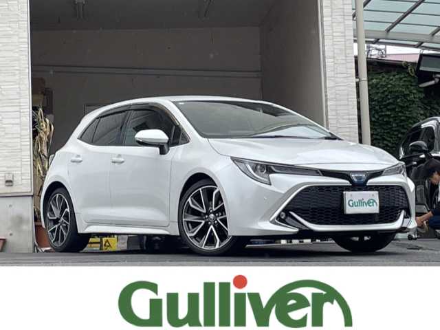 トヨタ カローラ スポーツ ハイブリッドG Z 大分県 2021(令3)年 5万km プラチナホワイトパールマイカ 純正18インチアルミホイール/純正フロアマット/純正ビルトインETC/社外ドラレコ/シートヒーター/横滑り防止装置/衝突被害軽減ブレーキ/オートライト/バックカメラ/クルーズコントロール/スマートキー