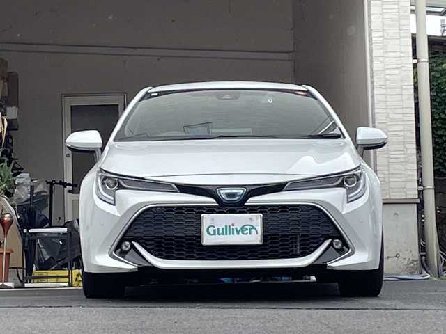 トヨタ カローラ スポーツ ハイブリッドG Z 大分県 2021(令3)年 5万km プラチナホワイトパールマイカ 純正18インチアルミホイール/純正フロアマット/純正ビルトインETC/社外ドラレコ/シートヒーター/横滑り防止装置/衝突被害軽減ブレーキ/オートライト/バックカメラ/クルーズコントロール/スマートキー