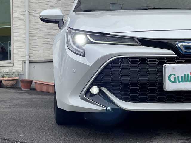 トヨタ カローラ スポーツ ハイブリッドG Z 大分県 2021(令3)年 5万km プラチナホワイトパールマイカ 純正18インチアルミホイール/純正フロアマット/純正ビルトインETC/社外ドラレコ/シートヒーター/横滑り防止装置/衝突被害軽減ブレーキ/オートライト/バックカメラ/クルーズコントロール/スマートキー