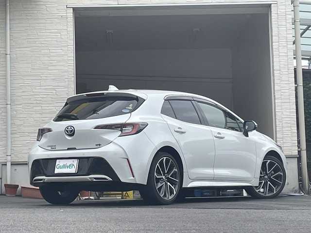 トヨタ カローラ スポーツ ハイブリッドG Z 大分県 2021(令3)年 5万km プラチナホワイトパールマイカ 純正18インチアルミホイール/純正フロアマット/純正ビルトインETC/社外ドラレコ/シートヒーター/横滑り防止装置/衝突被害軽減ブレーキ/オートライト/バックカメラ/クルーズコントロール/スマートキー