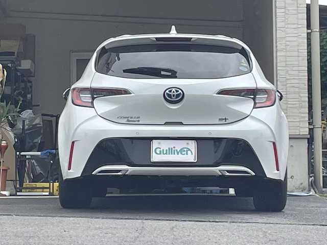 トヨタ カローラ スポーツ ハイブリッドG Z 大分県 2021(令3)年 5万km プラチナホワイトパールマイカ 純正18インチアルミホイール/純正フロアマット/純正ビルトインETC/社外ドラレコ/シートヒーター/横滑り防止装置/衝突被害軽減ブレーキ/オートライト/バックカメラ/クルーズコントロール/スマートキー