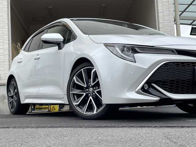 トヨタ カローラ スポーツ ハイブリッドG Z 大分県 2021(令3)年 5万km プラチナホワイトパールマイカ 純正18インチアルミホイール/純正フロアマット/純正ビルトインETC/社外ドラレコ/シートヒーター/横滑り防止装置/衝突被害軽減ブレーキ/オートライト/バックカメラ/クルーズコントロール/スマートキー