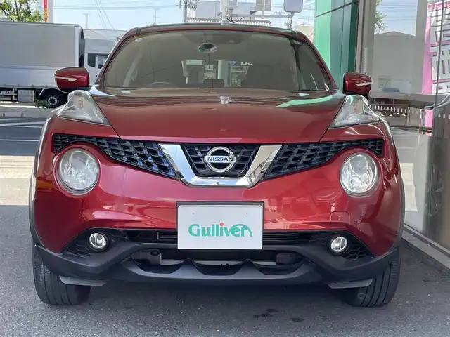 日産 ジューク 15RX Vセレクション 愛知県 2016(平28)年 2.6万km ラディアントレッド ワンオーナー/純正メモリナビ〈MJ116D-W〉/フルセグＴＶ/CD/AUX/バックカメラ/ビルトインETC/純正フロアマット/アイドリングストップ/車線逸脱警報/エマージェンシーブレーキ/ビークルダイナミクスコントロール/ステアリングスイッチ/フロントフォグランプ