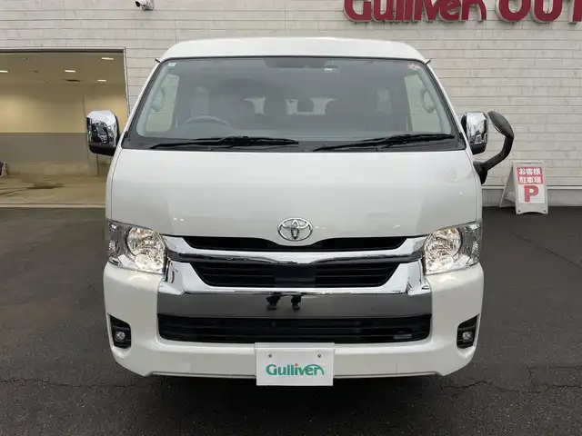 トヨタ ハイエース GL ロング 群馬県 2024(令6)年 1万km ホワイトパールクリスタルシャイン トヨタセーフティセンス/・プリクラッシュセーフティ/・レーンディパーチャーアラート/・オートマチックハイビーム/・クリアランスソナー/・パーキングサポートブレーキ/ALPINEナビ/　　Bluetooth/フルセグ/SD/    USB/FM/AM/パノラミックビューモニター/デジタルインナーミラー/助手席側パワースライドドア/10人乗り/4WD/ALPINE12.8型フリップダウンモニター/前後ドライブレコーダー（ナビ連動）/オートLEDヘッドライト/フォグランプ/スマートキー/ステアリングスイッチ