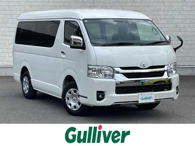 トヨタ ハイエース GL ロング 群馬県 2024(令6)年 1万km ホワイトパールクリスタルシャイン トヨタセーフティセンス/・プリクラッシュセーフティ/・レーンディパーチャーアラート/・オートマチックハイビーム/・クリアランスソナー/・パーキングサポートブレーキ/ALPINEナビ/　　Bluetooth/フルセグ/SD/    USB/FM/AM/パノラミックビューモニター/デジタルインナーミラー/助手席側パワースライドドア/10人乗り/4WD/ALPINE12.8型フリップダウンモニター/前後ドライブレコーダー（ナビ連動）/オートLEDヘッドライト/フォグランプ/スマートキー/ステアリングスイッチ