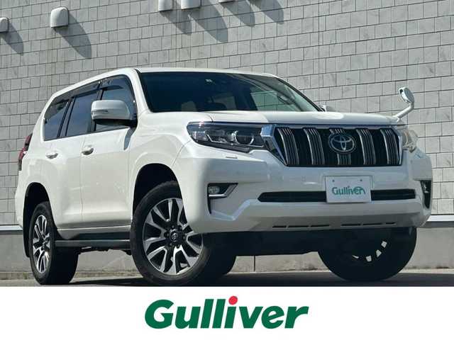 トヨタ ランドクルーザー プラド TX Lパッケージ 山形県 2022(令4)年 4.3万km ホワイトパールクリスタルシャイン ワンオーナー/4WD/純正9インチSDメモリナビ(NSZT-Y68T)/BT/CD/SD/フルセグTV/バックカメラ/本革シート/前席パワーシート/前席シートヒーター/前席エアシート/電動格納サードシート/追従機能付きクルーズコントロール/レーンキープアシスト/前後コーナーセンサー/LEDヘッドライト/前後フォグランプ/オートハイビーム/本革巻ステアリング/純正19インチAW/純正フロアマット