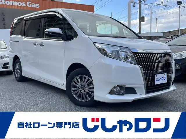 トヨタ エスクァイア Gi 兵庫県 2016(平28)年 12.4万km ホワイトパールクリスタルシャイン (株)IDOMが運営する【じしゃロン西宮店】の自社ローン対象車両になります。こちらは現金ご利用時の価格です。/自社ローンご希望の方は別途その旨お申付け下さい。/＊純正ナビ/＊ワンセグテレビ/＊バックカメラ/＊両側パワースライドドア/＊ETC/＊クルーズコントロール
