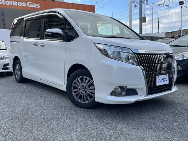 トヨタ エスクァイア Gi 兵庫県 2016(平28)年 12.4万km ホワイトパールクリスタルシャイン (株)IDOMが運営する【じしゃロン西宮店】の自社ローン対象車両になります。こちらは現金ご利用時の価格です。/自社ローンご希望の方は別途その旨お申付け下さい。/＊純正ナビ/＊ワンセグテレビ/＊バックカメラ/＊両側パワースライドドア/＊ETC/＊クルーズコントロール