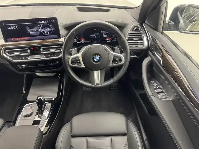 ＢＭＷ ＢＭＷ Ｘ３ xDrive20d Mスポーツ 兵庫県 2023(令5)年 1.3万km サファイアブラックP 純正HDDナビ/（AM/FM/Bluetooth/フルセグTV）/バックカメラ/アラウンドビューモニター/横滑り防止装置/レーンキープアシスト/盗難防止装置/衝突軽減システム/カーテンエアバッグ/インテリジェントセーフティー/アダクティブクルーズコントロール/ブレーキホールド/コーナーセンサー（前後）/レザーシート/シートヒーター（D/N席）/パワーシート（D/N席）/パワーバックドア/ヘッドアップディスプレイ/ブラインドスポットモニター/パドルシフト/アンビエントライト/LEDヘッドライト/BMW LEDレーザーライト/オートライト/オートマチックハイビーム/ビルトインETC/MTモード付AT/4WD/ターボエンジン/前方ドライブレコーダー/ルーフレール/純正OP20インチアルミホイール/Mスポーツ50周年エンブレム/スマートキー/アイドリングストップ/純正フロアマット