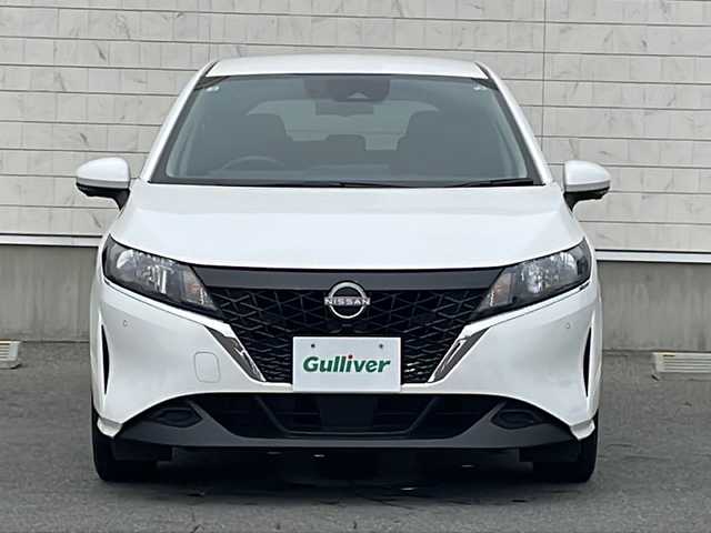 日産 ノート X FOUR 山形県 2022(令4)年 7.2万km ピュアホワイトパール 禁煙車/プロパイロット/ハンドル支援/デジタルルームミラー/・インテリジェントエマージェンシーブレーキ/・ふらつき警報/・前方衝突予測警報/・標識検知機能/・側方運転支援/・後側方衝突防止支援システム/・アラウンドビューモニター/・踏み間違い衝突防止アシスト/・後退時車両検知警報/・インテリジェント ルームミラー/・エマージェンシーストップシグナル/インテリジェントBSI/純正ナビ/BT.USB.AndoroidAuto.AppleCarPlay.HDMI/フルセグ/ビルトインETC2.0/ステアリングヒーター/シートヒーター/置くだけ充電/クリアランスソナー/電動パーキングブレーキ/オートホールド/プッシュスタート/スマートキー