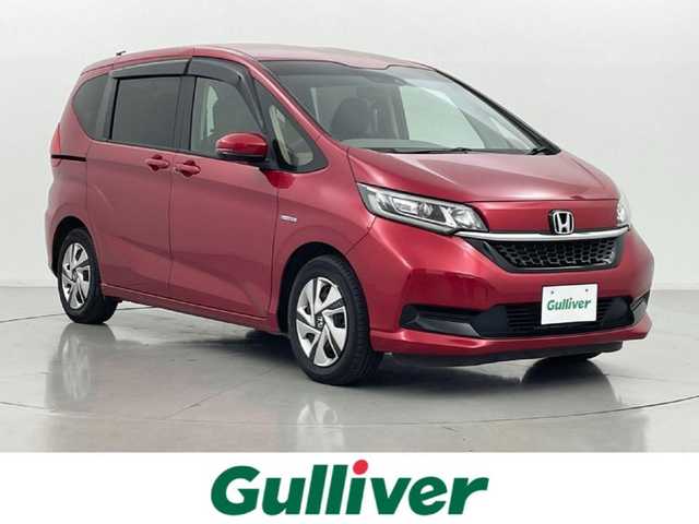 ホンダ フリード ハイブリット G ホンダセンシング 熊本県 2020(令2)年 4.7万km プレミアムクリスタルレッドM メーカーＯＰ９in純正メモリナビVXM-207VFNi/（AM・FM・BT・フルセグ・SD）/純正ビルトインETC/Bカメラ/純正前後ドライブレコーダー/追従クルーズコントロール/両側パワースライドドア/横滑り防止装置/衝突軽減システム/標識認識機能/先行車発進お知らせ機能/LEDヘッドライト/オートライト/エンジンスタートボタン/シートヒーターD+N/サンシェード/スマートキー/スペアキー1本/純正フロアマット