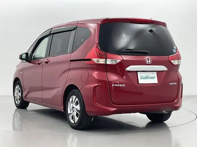 ホンダ フリード ハイブリット G ホンダセンシング 熊本県 2020(令2)年 4.7万km プレミアムクリスタルレッドM メーカーＯＰ９in純正メモリナビVXM-207VFNi/（AM・FM・BT・フルセグ・SD）/純正ビルトインETC/Bカメラ/純正前後ドライブレコーダー/追従クルーズコントロール/両側パワースライドドア/横滑り防止装置/衝突軽減システム/標識認識機能/先行車発進お知らせ機能/LEDヘッドライト/オートライト/エンジンスタートボタン/シートヒーターD+N/サンシェード/スマートキー/スペアキー1本/純正フロアマット
