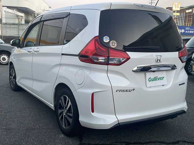ホンダ フリード＋ ハイブリット EX 兵庫県 2019(令1)年 5.4万km ホワイトオーキッドパール ワンオーナー/保証書・取説・有/純正メモリーナビ・BT・FM・AM/バックカメラ/ETC/ドライブレコーダー/追尾機能付きクルーズコントロール/車線逸脱防止支援システム/衝突被害軽減ブレーキ/ロードサインアシスト/先行車発進通知/両側パワースライドドア/アイドリングストップ/プッシュスタート/スマートキー×2/純正フロアマット/純正ドアバイザー