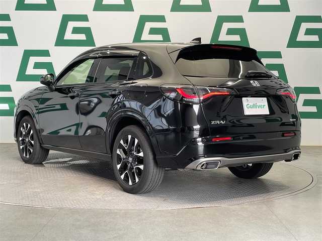 ホンダ ＺＲ－Ｖ ハイブリッド e:HEV Z 鹿児島県 2024(令6)年 2.4万km クリスタルブラックパール ワンオーナー/Honda SENSING/ブラインドスポットインフォメーション/後退出庫サポート/アダプティブドライビングビーム/マルチビューカメラシステム/Honda CONNECTディスプレー＋ETC2.0車載器＋ワイヤレス充電器/本革シート＋運転席8ウェイ助手席4ウェイパワーシート(ドライビングポジションシステム付)/運転席＆助手席シートヒーター/BOSEプレミアムサウンドシステム(12スピーカー)/ハンズフリーアクセスパワーテールゲート(予約クローズ機能付)/18インチアルミホイール(切削＋ベルリナブラック)/ドライブレコーダー【DRH-224SD】/禁煙