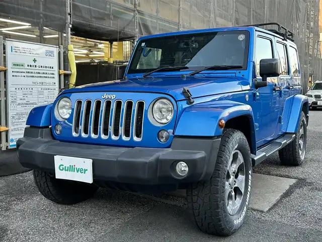 クライスラー・ジープ ジープ ラングラー アンリミテッド サハラ 千葉県 2016(平28)年 8万km 青 取扱説明書、保証書、スペアキー/社外SDナビ　AVIC-RZ103/AM/FM/BT/ワンセグ/クルーズコントロール/ステアリングスイッチ/前後ドライブレコーダー/サイドカメラ/ETC/背面タイヤ/ダウンヒルコントロール/横滑り防止機能/アルパインスピーカー/ルーフキャリア