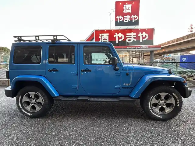 クライスラー・ジープ ジープ ラングラー アンリミテッド サハラ 千葉県 2016(平28)年 8万km 青 取扱説明書、保証書、スペアキー/社外SDナビ　AVIC-RZ103/AM/FM/BT/ワンセグ/クルーズコントロール/ステアリングスイッチ/前後ドライブレコーダー/サイドカメラ/ETC/背面タイヤ/ダウンヒルコントロール/横滑り防止機能/アルパインスピーカー/ルーフキャリア