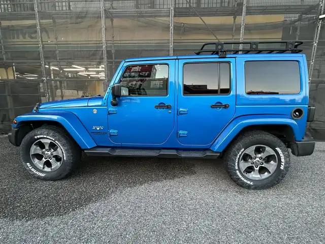 クライスラー・ジープ ジープ ラングラー アンリミテッド サハラ 千葉県 2016(平28)年 8万km 青 取扱説明書、保証書、スペアキー/社外SDナビ　AVIC-RZ103/AM/FM/BT/ワンセグ/クルーズコントロール/ステアリングスイッチ/前後ドライブレコーダー/サイドカメラ/ETC/背面タイヤ/ダウンヒルコントロール/横滑り防止機能/アルパインスピーカー/ルーフキャリア