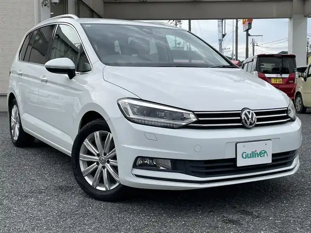 フォルクスワーゲン ゴルフ トゥーラン TSI ハイライン 長野県 2017(平29)年 5.9万km 白 ディーラー点検記録H30:R1:3:5:7年有り/・ワンオーナー　/・ディスカバープロ　　/・純正ナビフルセグTV　DVD　BTA/・バックカメラ　/・ＥＴＣ２．０　/・レーンアシスト　/・フロントアシスト/・プリクラッシュ　/・歩行者検知　/・ＡＣＣ　/・クルーズコントロール/・パドルシフト　/・アイドリングストップ　/・シートヒーター　/・ルーフレール/・純正17インチアルミ/・電子パーキングブレーキ/・オートホールド/・オートライト/・LEDヘットライト/・フォグライト/・スマートキー×２/・プッシュスタート/・保証書/・取説