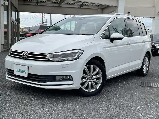 フォルクスワーゲン ゴルフ トゥーラン TSI ハイライン 長野県 2017(平29)年 5.9万km 白 ディーラー点検記録H30:R1:3:5:7年有り/・ワンオーナー　/・ディスカバープロ　　/・純正ナビフルセグTV　DVD　BTA/・バックカメラ　/・ＥＴＣ２．０　/・レーンアシスト　/・フロントアシスト/・プリクラッシュ　/・歩行者検知　/・ＡＣＣ　/・クルーズコントロール/・パドルシフト　/・アイドリングストップ　/・シートヒーター　/・ルーフレール/・純正17インチアルミ/・電子パーキングブレーキ/・オートホールド/・オートライト/・LEDヘットライト/・フォグライト/・スマートキー×２/・プッシュスタート/・保証書/・取説