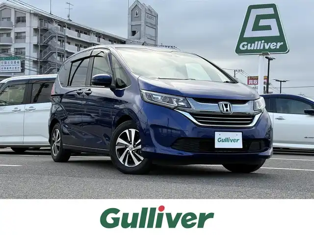 ホンダ フリード ハイブリット EX 大分県 2019(令1)年 3.9万km コバルトブルーパール ・ディスプレイオーディオ(BT/CarPlay/USB)/・バックモニター/・フリップダウンモニター/・レーダークルーズコントロール/・両側パワースライドドア/・衝突被害軽減ブレーキ/・ETC/・ドライブレコーダー/・シートヒーター/・オートライト/・ステアリングリモコン