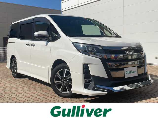 トヨタ ノア Si ダブルバイビー 鳥取県 2018(平30)年 6.1万km ホワイトパールクリスタルシャイン ワンオーナー/TRDエアロスタイル/エンジンスターター/７人乗り/スマートキー/ハーフレザーシート/両側パワースライド/デジタルインナーミラー/純正８インチワイドナビ/フリップダウンモニター/フルセグ・Bluetooth/バックカメラ/プリクラッシュ/レーンデパーチャー/クルーズコントロール/オートハイビーム/ドライブレコーダー/ダブルオートエアコン/リアサンシェード/LEDヘッドライト/LEDフォグライト/ETCユニット/保証書・取説